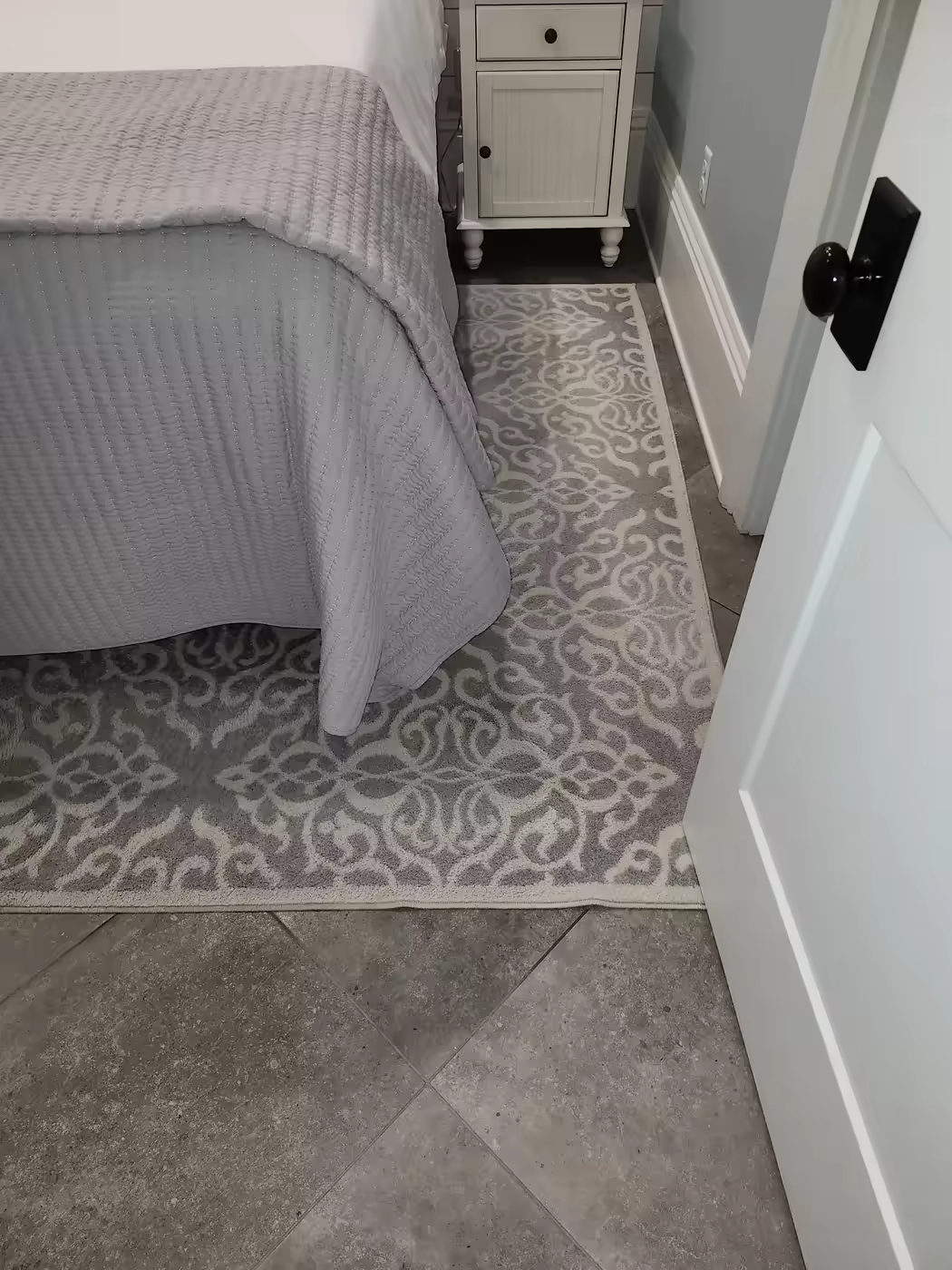 Clean bedroom area rug in a Pro-Techs customer home