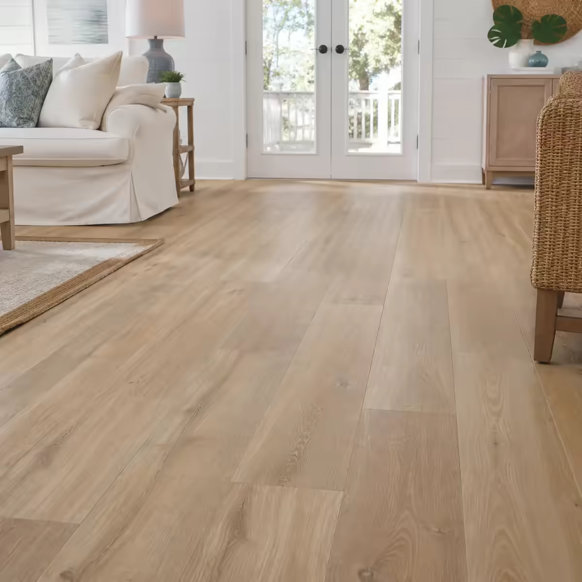 Example of luxury vinyl plank flooring in a bright Gulf Coast-style living room