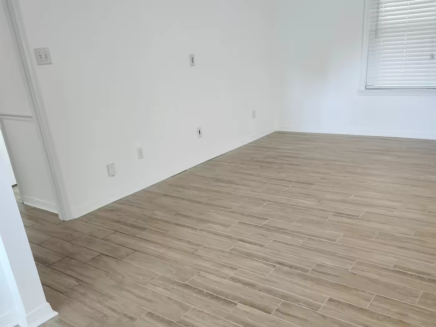 Wood-look ceramic tile and grout after a Pro-Techs tile and grout cleaning job
